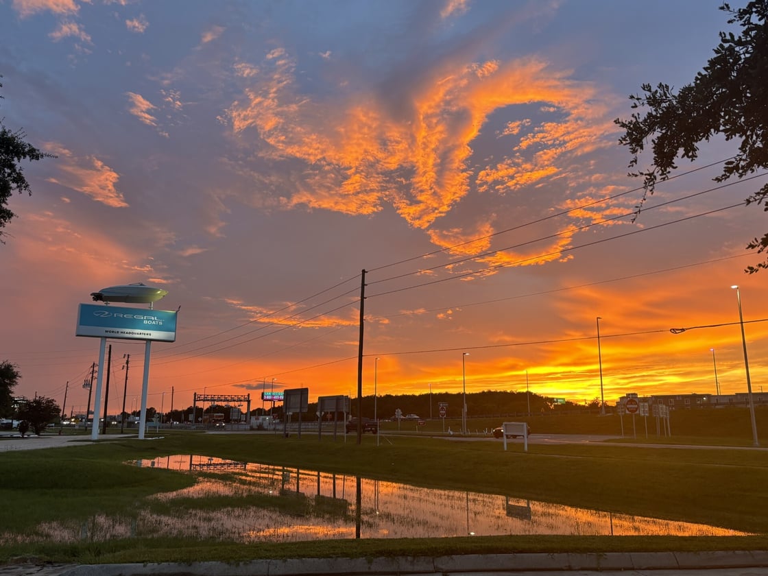 Beautiful sunset in Orlando FL outside Regal boats manufacturing plant - Jenny Serwitz
