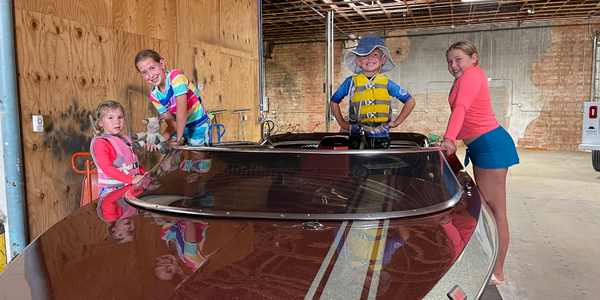 Grandkids excited to go to the lake in their granddads fifty-three year old Tahiti jet boat