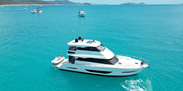 Hauling the anchor on our Maritimo M55 at Whitehaven Beach Australia voted one of the most beautiful beaches in the World.