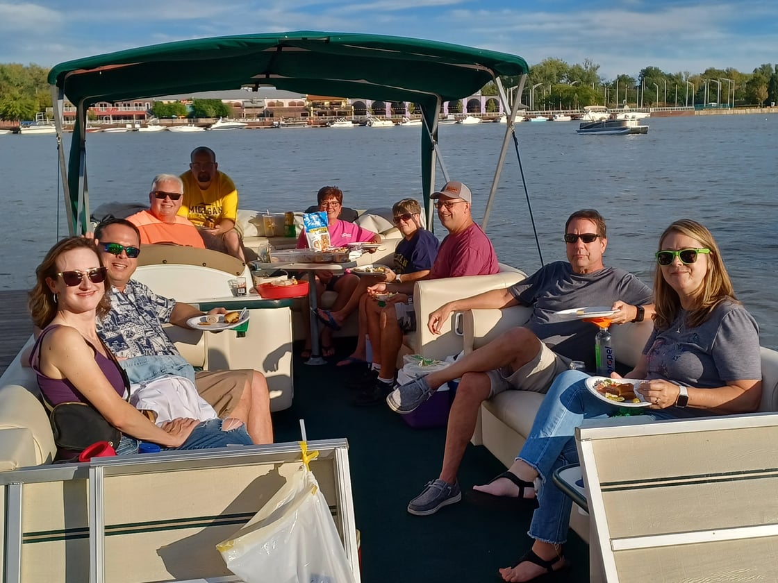 Heres a photo of friends on our pontoon in Toledo Ohio just prior to an outdoor Flo Rida concert at the Promenade Pavillion Rick Popiolek