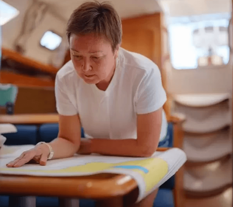 Poring over a paper chart