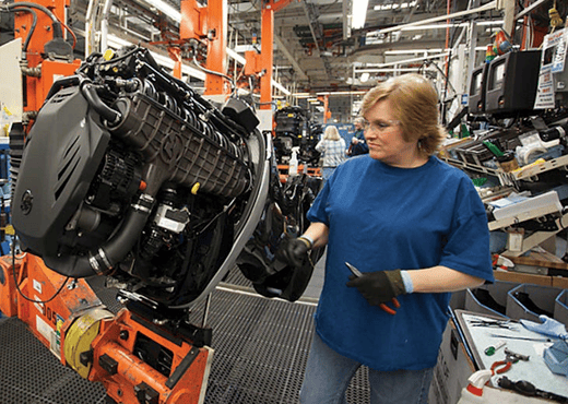 Brunswick employee working on engine
