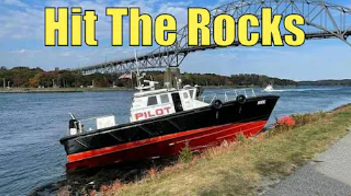 Pilot boat on the rocks