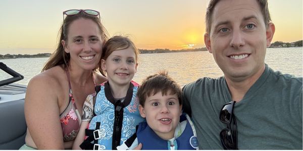 The Stoner family enjoying the sunset on Lake Conway in Orlando, FL