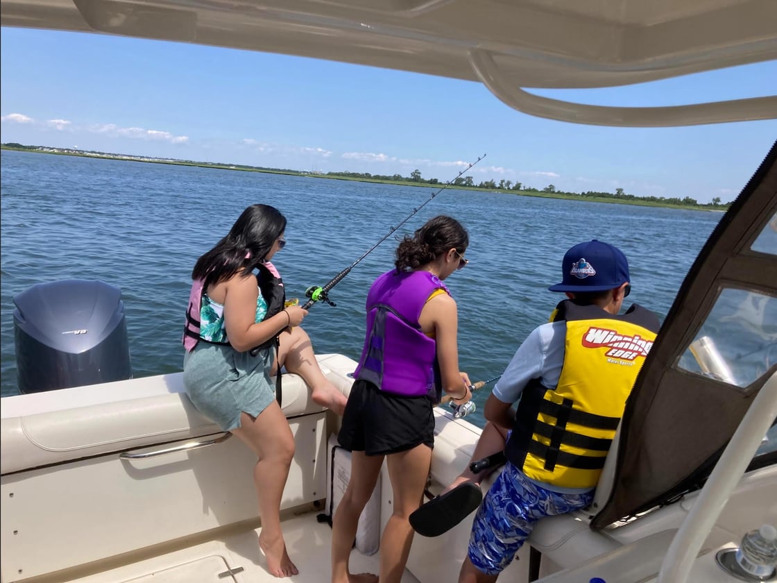 Tom DiPasquale teens fishing